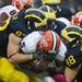 Michigan defense tackles Illinois running back Donovonn Young in the second quarter on Saturday. Michigan leads 17-0 at halftime. Daniel Brenner I AnnArbor.com